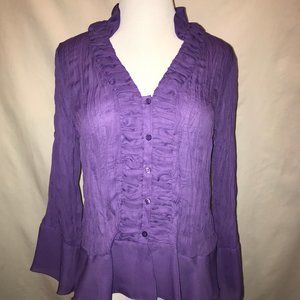 Sheer form-fitting crinkly purple blouse